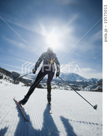 Woman cross country skiing Woman cross country skiing 10575015