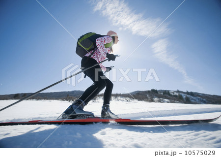 Woman cross country skiing Woman cross country skiing 10575029