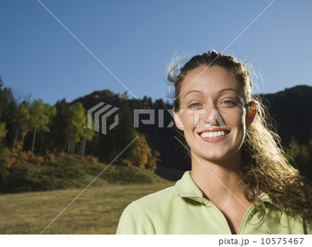 Woman with hair blowing outdoors, Utah, United States Woman with hair blowing outdoors, Utah, United States 10575467