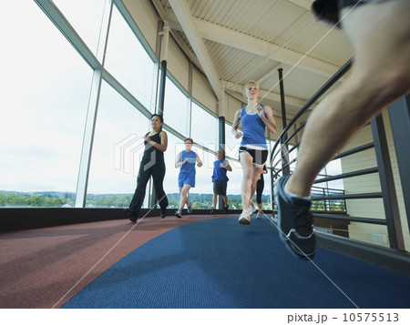 Runners on indoor track 10575513