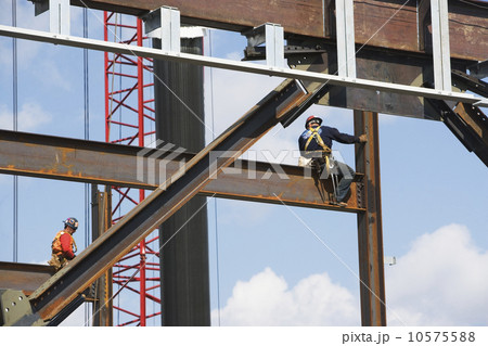 Male workers on construction site 10575588