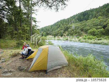 Couple relaxing at campsite 10575626