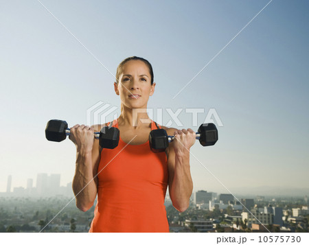Woman doing weight training 10575730