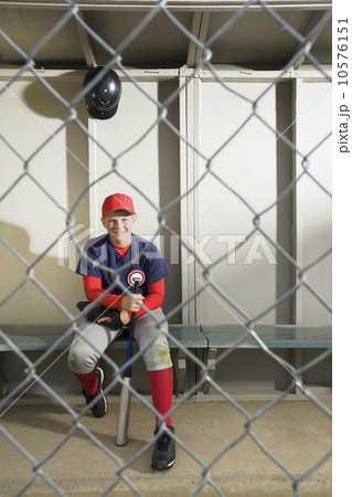 Baseball player sitting in dugout Baseball player sitting in dugout 10576151
