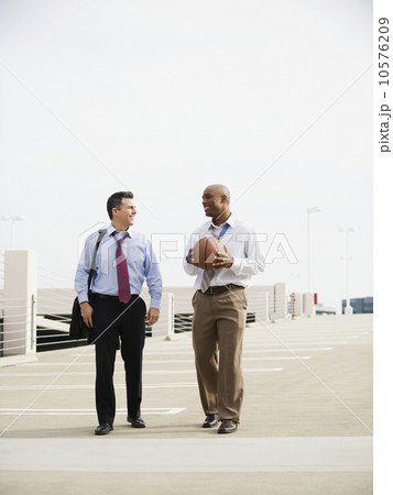 Businessman on their way to basketball game Businessman on their way to basketball game 10576209