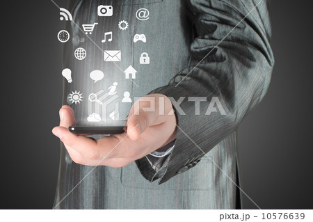 Man uses smart phone with icons. Man uses smart phone with icons. 10576639