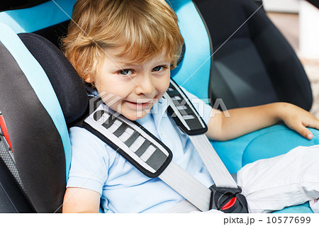 Little boy of 3 years sitting in safety car seat. Little boy of 3 years sitting in safety car seat. 10577699