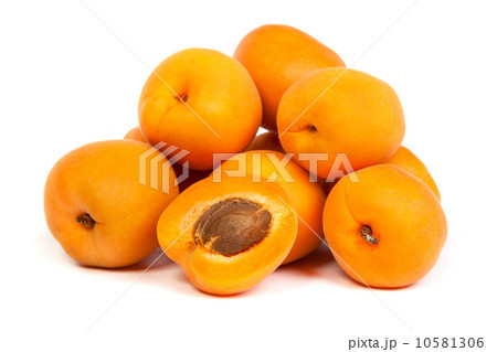 Group of ripe apricots with a half 10581306