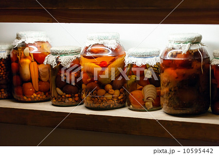 Homemade colorful vegetables in jars Homemade colorful vegetables in jars 10595442