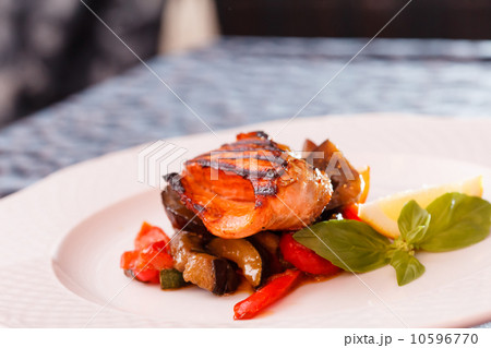 salmon steak with vegetables 10596770