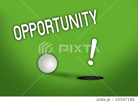 Putted Golf Ball On Edge of Hole 10597186