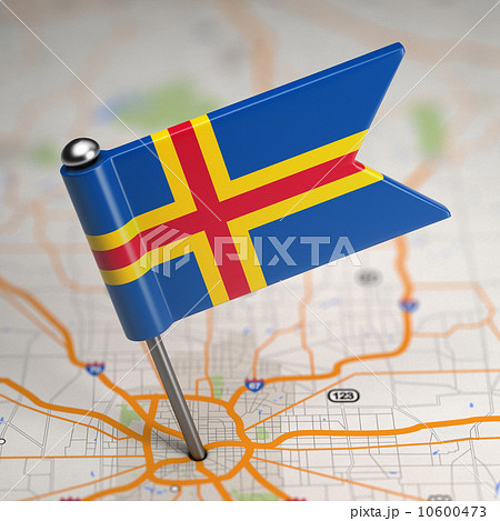 Aland Islands Small Flag on a Map Background. 10600473