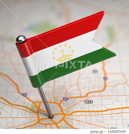 Tajikistan Small Flag on a Map Background. 10600509