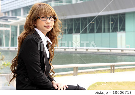 young business woman and an office background 10606713
