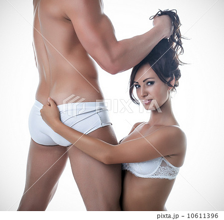 Image of young sensual lovers posing at camera 10611396