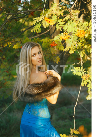 Fashion portrait of young sensual woman in garden 10621160