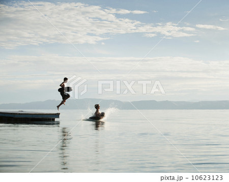 Boys (10-11,12-13) jumping from raft Boys (10-11,12-13) jumping from raft 10623123