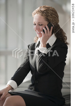 USA, Virginia, Virginia Beach, businesswoman talking on phone 10623458