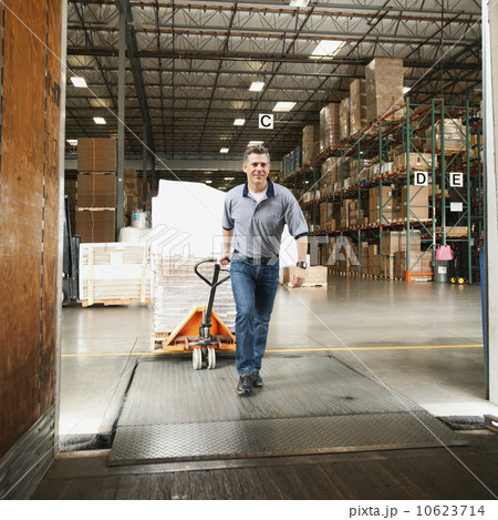 Man working in warehouse Man working in warehouse 10623714