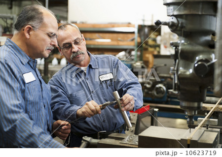 Skilled workers in factory 10623719