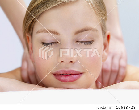 Young woman getting massage Young woman getting massage 10623728
