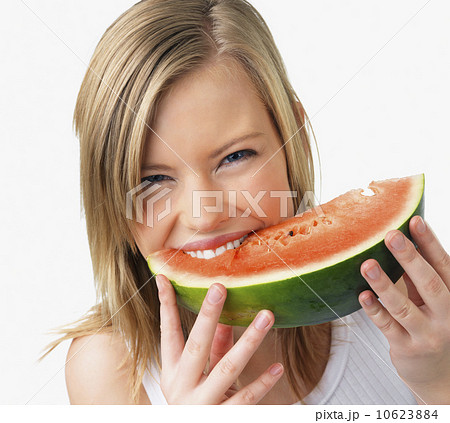 Woman eating watermelon Woman eating watermelon 10623884