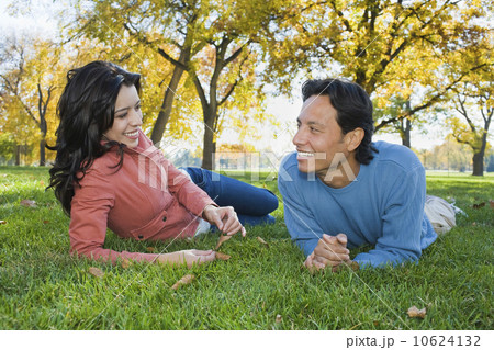 Couple laying in grass 10624132