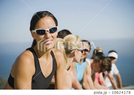 Runners resting on the side of the road 10624178