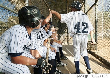 USA, California, Ladera Ranch, Boys (10-11) from little league sitting on dugout USA, California, Ladera Ranch, Boys (10-11) from little league sitting on dugout 10624183