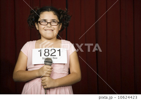 Girl wearing number on stage 10624423