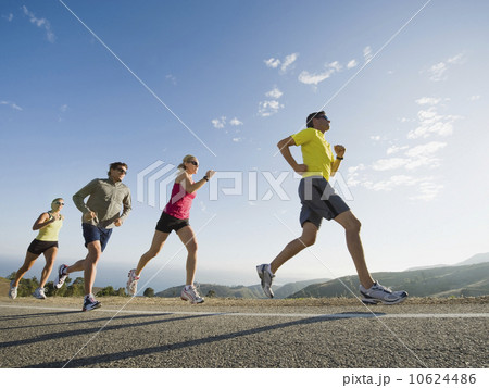 Runners on a road in Malibu 10624486