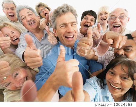 A group of people giving the thumbs up sign A group of people giving the thumbs up sign 10624563