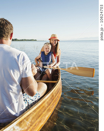 Portrait of young woman with son (4-5) canoe traveling 10624703