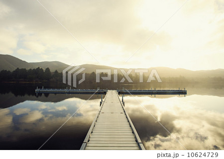 Landscape with sky reflected in water Landscape with sky reflected in water 10624729