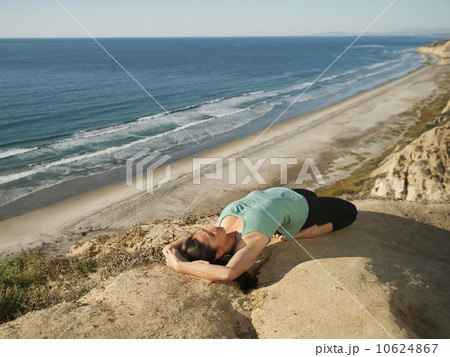 USA, California, San Diego, Woman practicing yoga on beach USA, California, San Diego, Woman practicing yoga on beach 10624867
