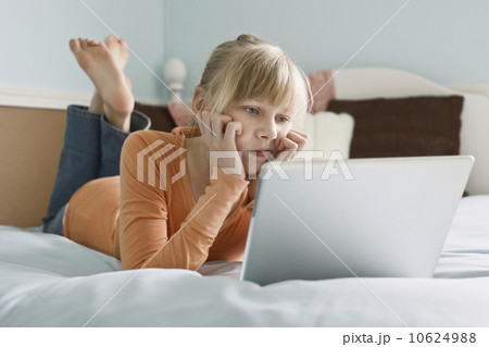 Girl looking at laptop 10624988