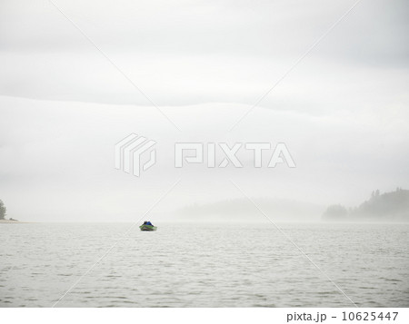 Distant view of people in boat Distant view of people in boat 10625447