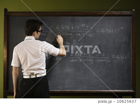 Man writing on blackboard 10625637