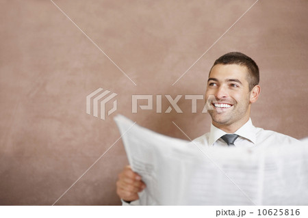 Businessman reading newspaper Businessman reading newspaper 10625816