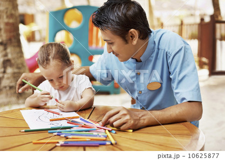 Portrait of teacher and girl (3) at table Portrait of teacher and girl (3) at table 10625877