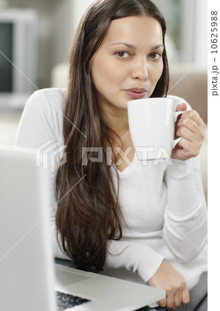 Woman drinking coffee Woman drinking coffee 10625988