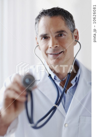 Doctor holding stethoscope 10626081