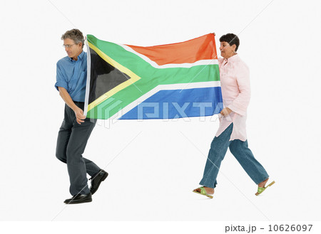 Two people carrying the South African flag 10626097