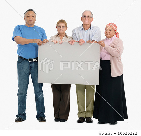 Four people holding a blank poster 10626222