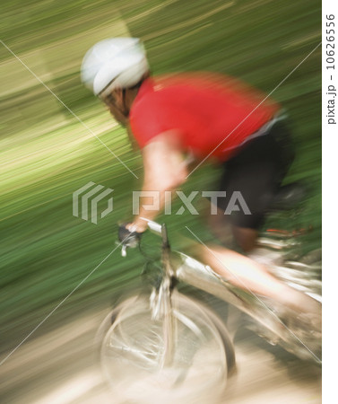Blurred shot of man riding mountain bike 10626556