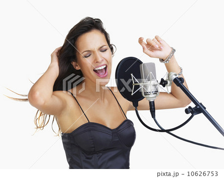 Studio shot of singing rockstar 10626753