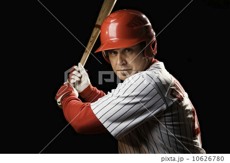 Portrait of batter holding baseball bat 10626780