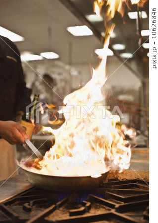 Chef cooking with flame 10626846