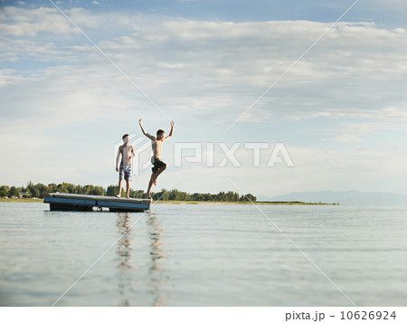 Boys (10-11,12-13) jumping from raft 10626924