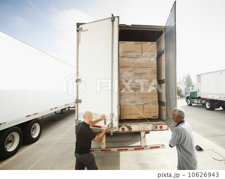 Two men close in truck trailer Two men close in truck trailer 10626943